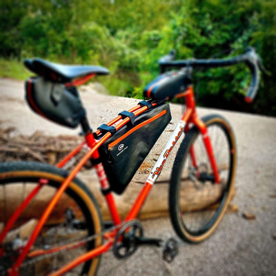 Gravel bike fitted with Orange Mud frame and seat bags