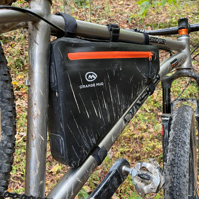 Orange Mud frame bag mounted on a bike