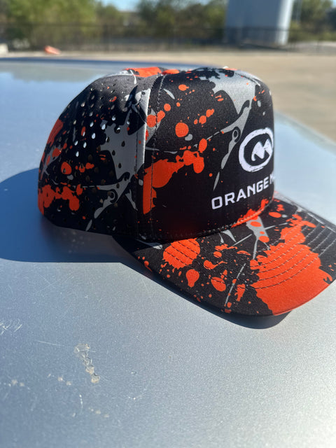 Orange_Mud_Splatter_Performance_Hat_Side_View Further Out