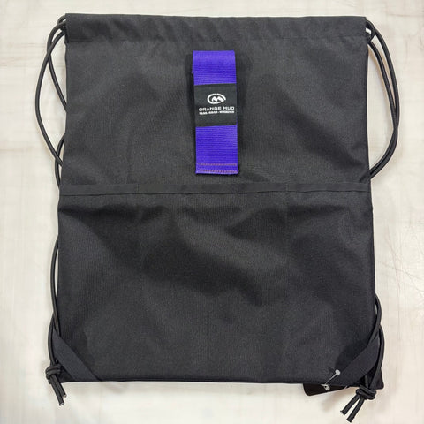 Orange Mud, LLC Packs Black with Purple Strap Sling Bag